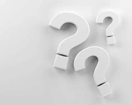 White 3D question mark symbol on light background, representing inquiries and seeking information about mental health services and assessments