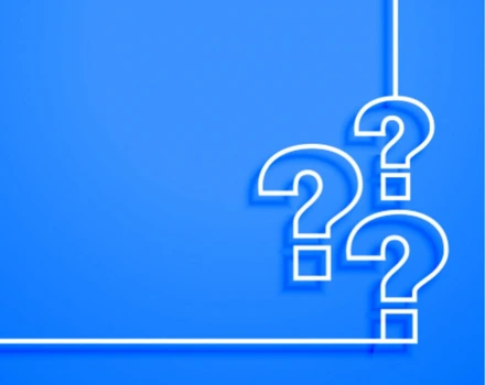 Three white question mark outlines on bright blue background, symbolizing common questions and inquiries about healthcare insurance coverage and mental health services