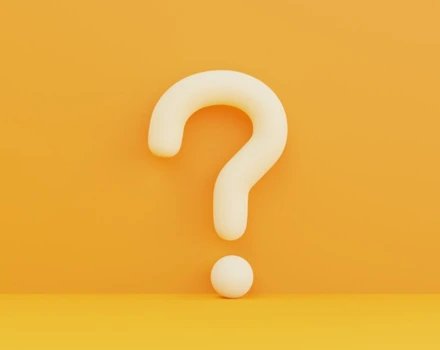 Large white question mark on bright orange background, representing questions and inquiries about healthcare insurance coverage and mental health benefits