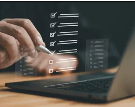 Hand hovering over laptop with digital checklist overlay showing completed and pending items, illustrating the process of working through an online mental health assessment questionnaire