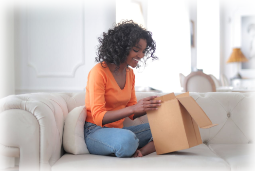 An Almadelic client receiving and opening their welcome kit.